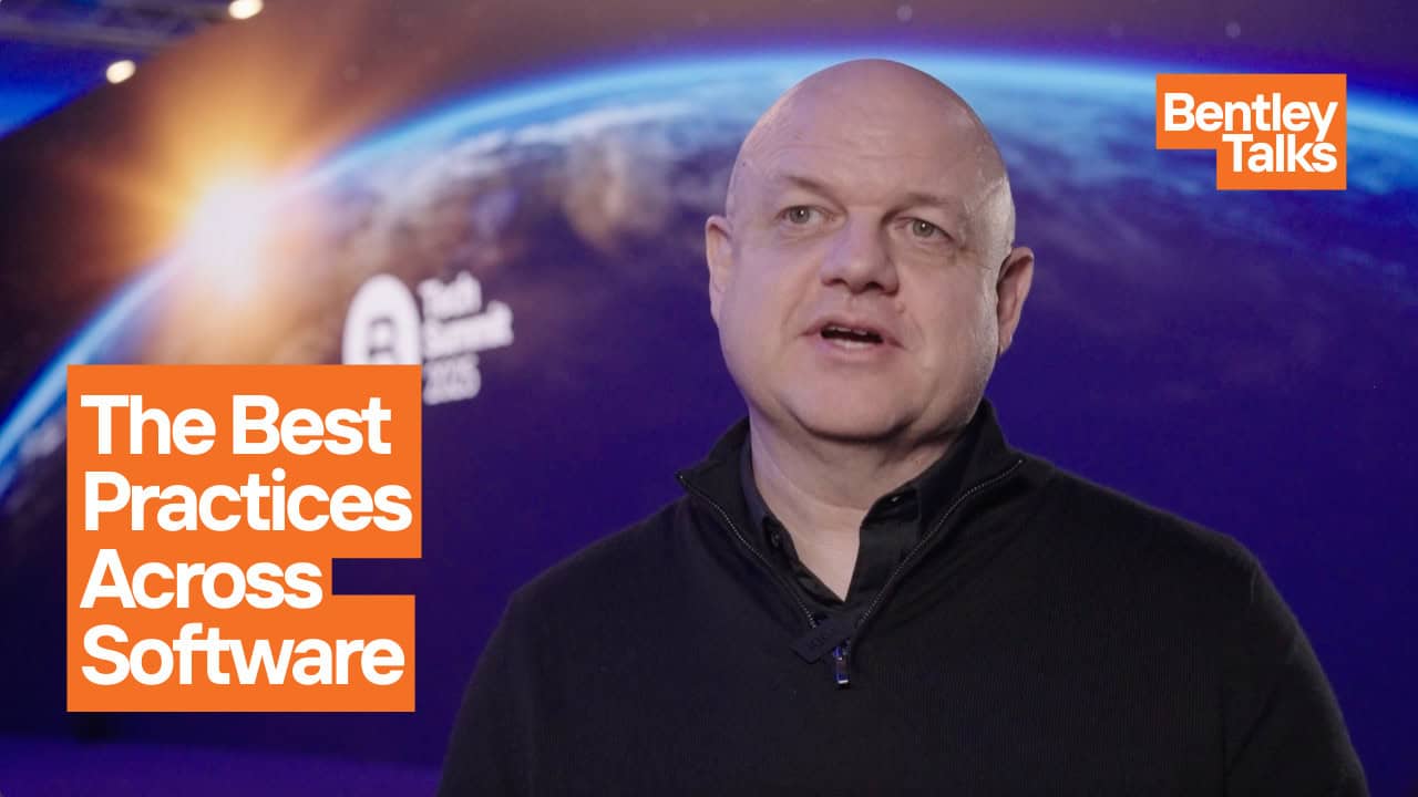 A man speaks on camera in front of a digital Earth backdrop, with text reading "The Best Practices Across Software" and "Bentley Talks" displayed in orange boxes.