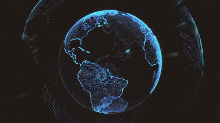 A digital rendering of Earth shows a glowing blue schematic of continents on a black background.
