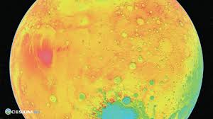 Color-coded topographic map of a planet's surface, showing varying elevations with shades of yellow, green, red, and blue. The Cesium ion watermark is present in the lower left corner.