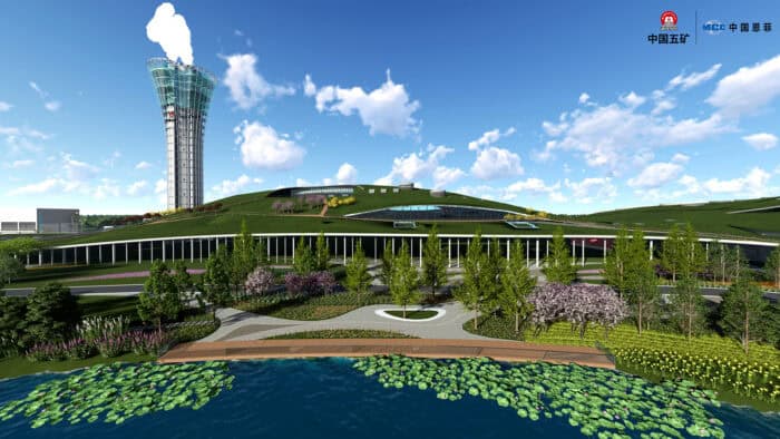 Modern building with a green, grass-covered roof, surrounding gardens, and a pond with lily pads showcases Xiong’an’s vision for greener urban living, complemented by a tall observation tower in the background under a blue sky.