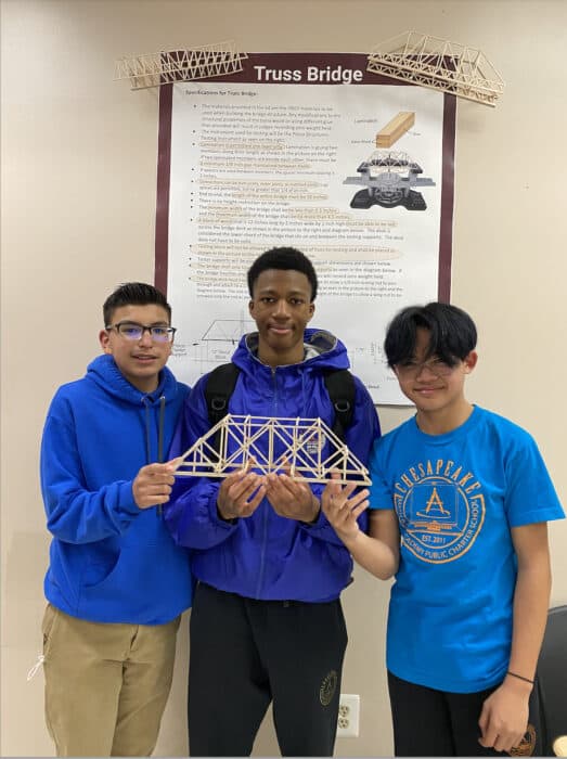 TRAC competition winners holding their bridge