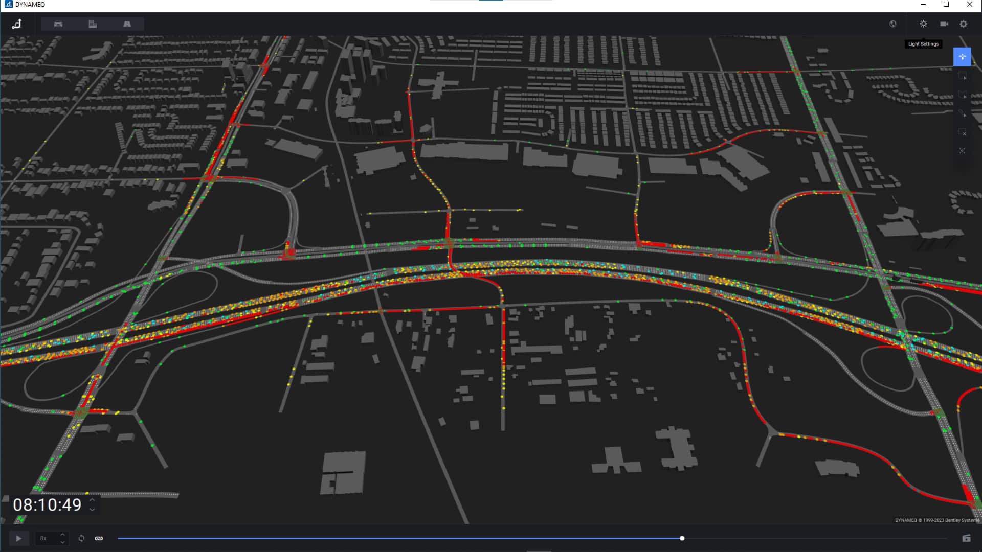 A digital map displays city streets and highways with traffic flow indicated by colored lines: green for light, yellow for moderate, and red for heavy congestion.