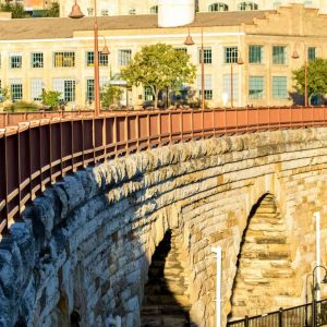 Bicyclist on the Stone Arch Bridge in Minneapolis