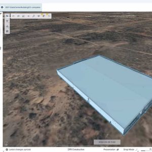 A 3D model of a rectangular building is displayed on a map in SYNCHRO+, Bentley’s AI-powered 4D construction planning software interface.