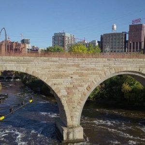 Drone flying near bridge