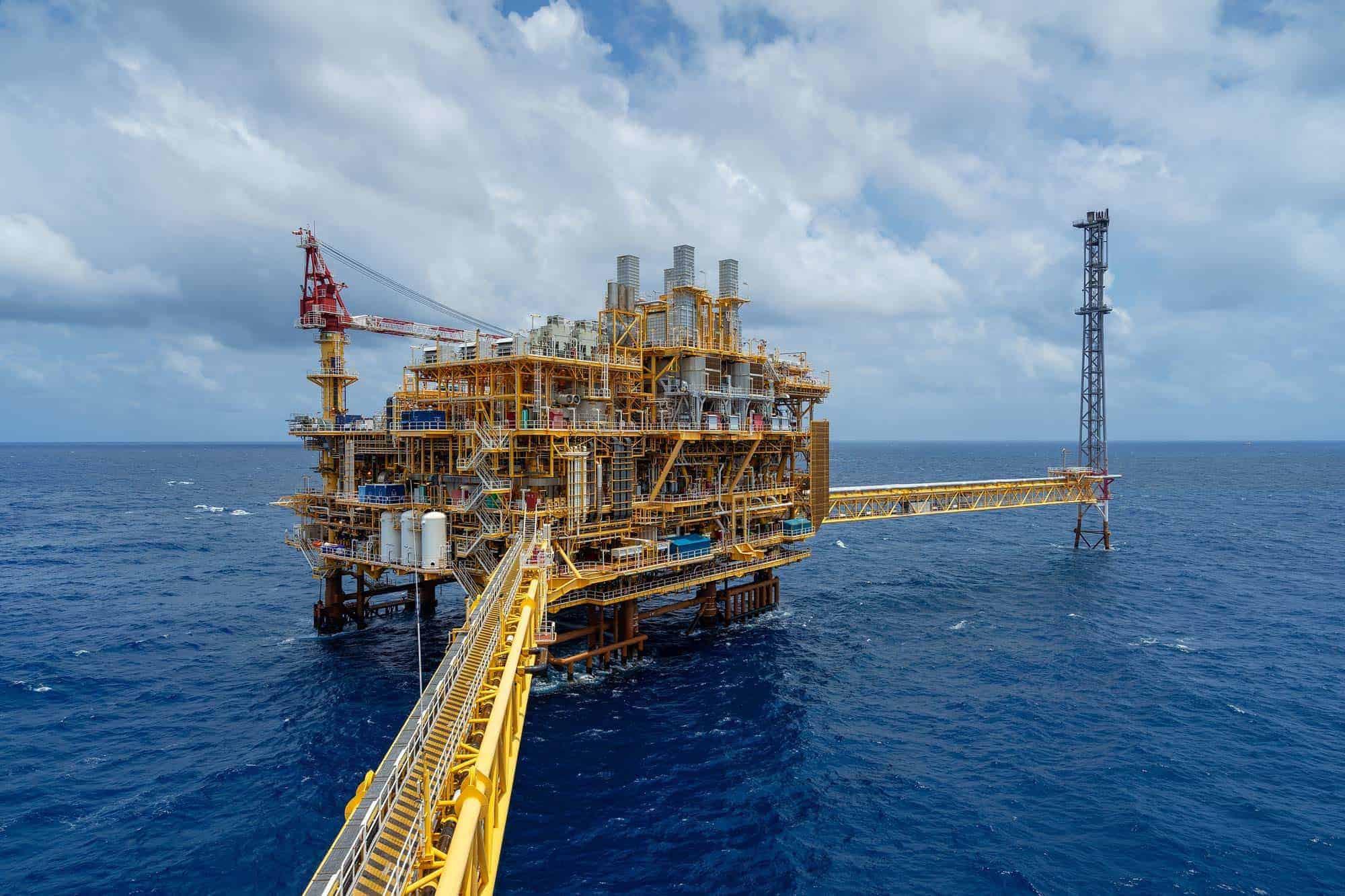 Offshore oil and gas platform in operation at sea.