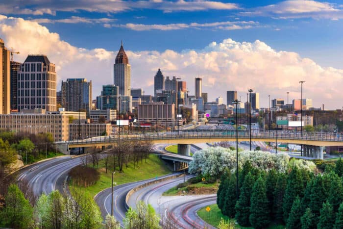 Atlanta skyline with intersecting highways on a clear day.