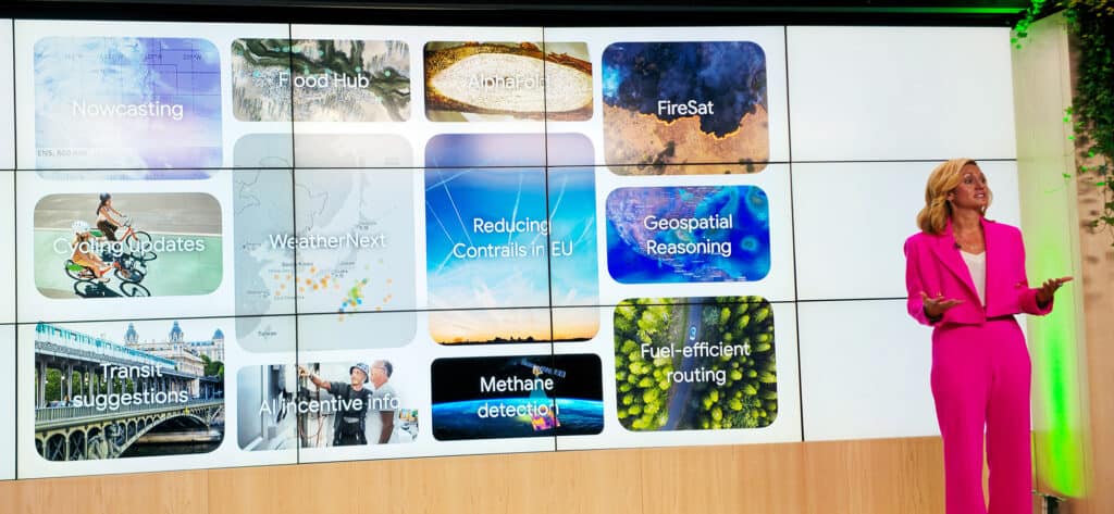 A woman in a pink suit presents in front of a screen displaying technology project titles like "Nowcasting," "FireSat," and "Methane detection," highlighting the use of AI for Earth and Google tools to help predict disasters.