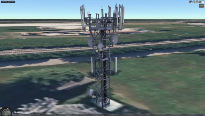 A 3D rendering of communications tower is being represented using Gaussian splats.