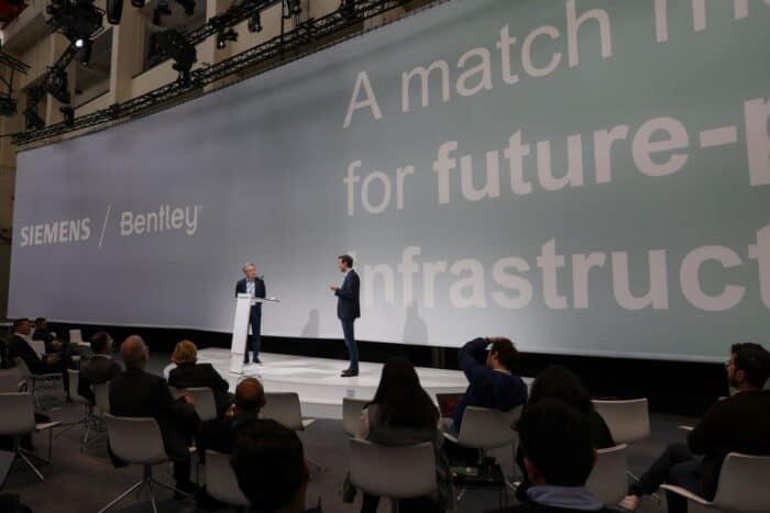 Image of Bentley COO and Siemens CTO on stage discussing partnership