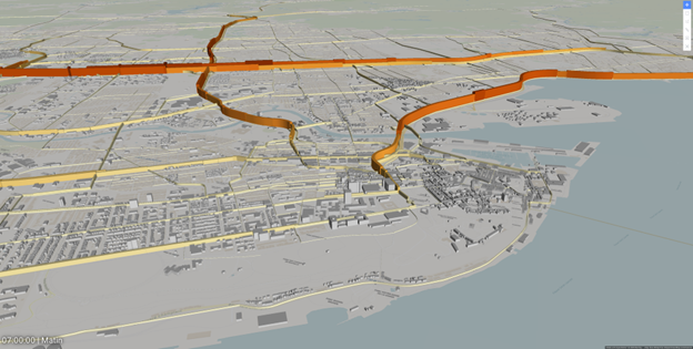 3D map view showing a cityscape in Québec City, with orange and yellow highlighted routes crossing over a river and extending through urban areas toward the waterfront—ideal for visualizing Transportation Planning with Bentley OpenPaths.