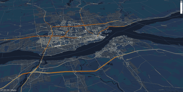 A digital map of Québec City shows a wide river dividing the city, with Bentley OpenPaths highlighting major roads and detailed street layouts on both banks for efficient transportation planning.