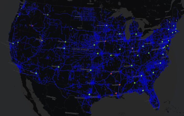 A map of the United States shows a network of blue lines representing routes and scattered green and orange points marking specific locations.