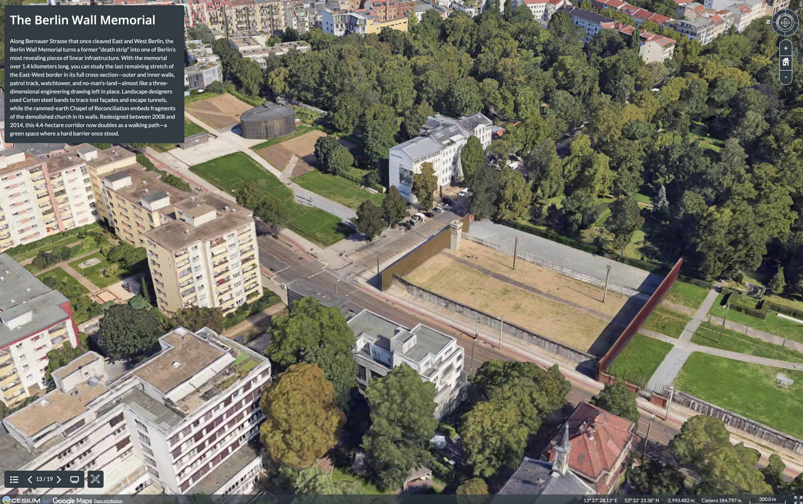 Aerial view of the Berlin Wall Memorial, showing preserved wall sections, nearby buildings, green spaces, and informational displays in an urban park setting.