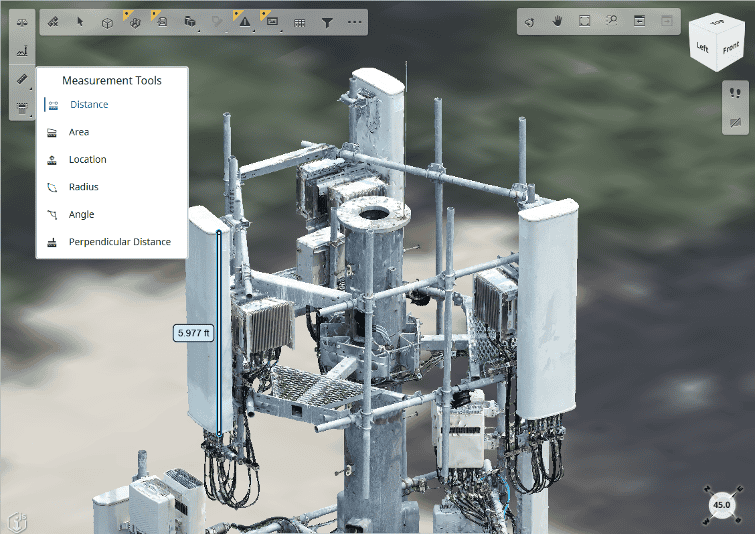 Close-up view of a telecoms cell tower with multiple antennas and electrical components, displaying measurement tools on a digital interface—showcasing engineering for impact inspired by Apurba Tribedi.