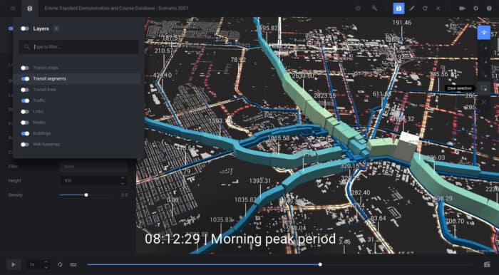 3D map with highlighted blue transit lines and green segments. An overlay shows data layers, and text reads "08:12:29 | Morning peak period.