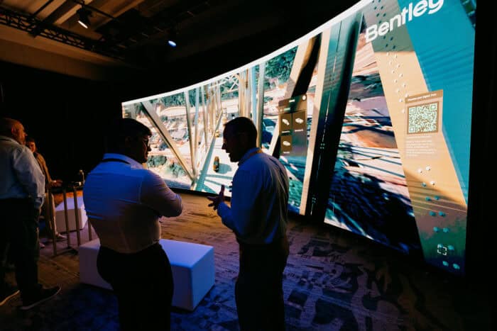 Attendees experience an immersive video at the iLab exhibit during the 2024 Year in Infrastructure event in Vancouver.